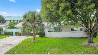 113 Park Ln E, Hypoluxo, FL 33462