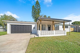 241 NE 3rd St, Satellite Beach, FL 32937