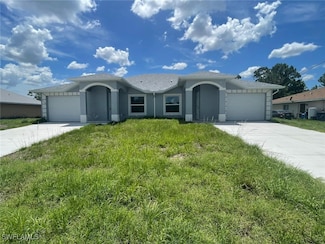 1112 Ivan Ave S, Lehigh Acres, FL 33973