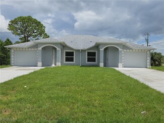 397 Carrillon Ave S, Lehigh Acres, FL 33974