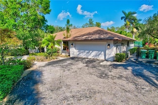 5191 Mahogany Ridge Dr, Naples, FL 34119