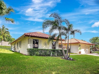 243 Deer Creek Woodlake Cir, Deerfield Beach, FL 33442