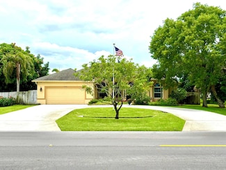 1456 SW Del Rio Blvd, Port Saint Lucie, FL 34953