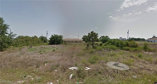 705/707 Gilbert Ave S, Lehigh Acres, FL 33973