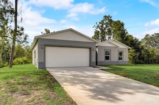 166 Fremont Ave S, Lehigh Acres, FL 33974