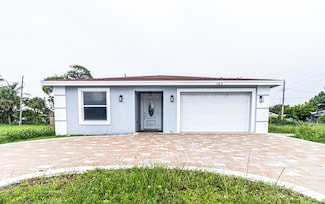 163 W Blue Heron Blvd, Riviera Beach, FL 33404