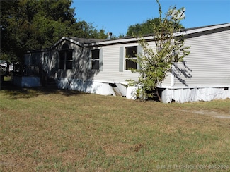 206 S 13th St, Mannsville, OK 73447