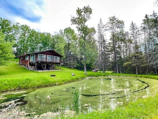 3420 W Hubbard Lake Trail, Hubbard Lake, MI 49747