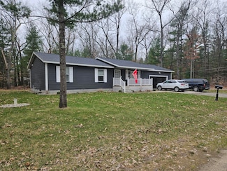 687 W Cherry Rd, Twin Lake, MI 49457