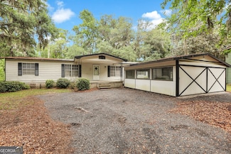 357 Wild Heron Dr, Midway, GA 31320
