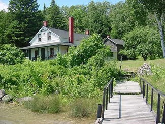 17313 S Rains Island Row, Barbeau, MI 49710