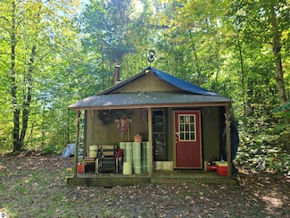 7530 Woodridge Acres, Mancelona, MI 49659