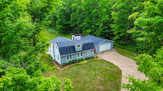 8571 W Cameron Bridge Rd, Frederic, MI 49733