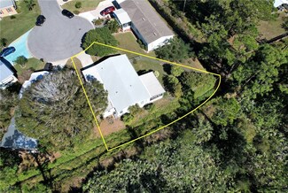 208 Calico Ct, Barefoot Bay, FL 32976