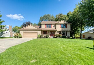 728 W Woodmeade Ct SE, Ada, MI 49301