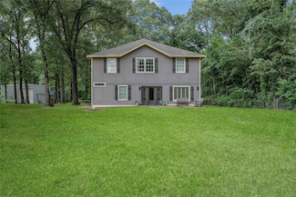15392 Paradise Point Dr, Willis, TX 77318