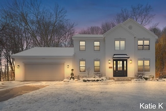 737 W Woodmeade Ct SE, Ada, MI 49301