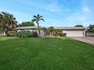 8157 Pine Tree Ln, West Palm Beach, FL 33406