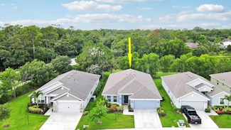 886 NE Whistling Duck Way, Port St. Lucie, FL 34983