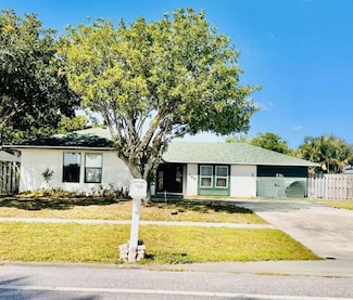 120 La Mancha Ave, Royal Palm Beach, FL 33411