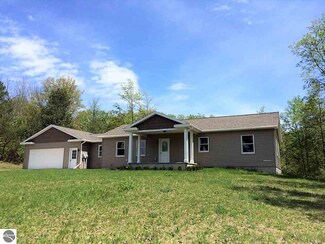 1242 N Buhland Rd, Central Lake, MI 49622
