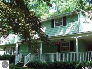 2865 E Rock Rd, Clare, MI 48617