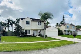 9928 Moss Pond Dr, Boca Raton, FL 33496