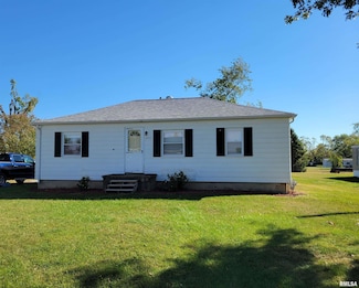 203 S E St, La Harpe, IL 61450