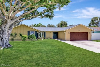 124 Flame Vine Dr, Naples, FL 34110