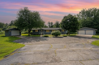 1909 N 5 Mile Rd, Sanford, MI 48657