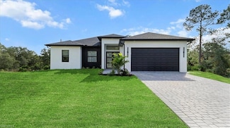 910 Truman Ave, Lehigh Acres, FL 33972