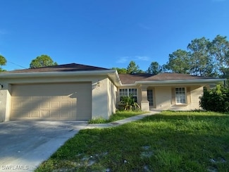 208 Homewood Ave S, Lehigh Acres, FL 33974