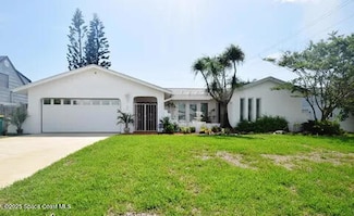 313 School Rd, Indian Harbour Beach, FL 32937