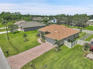 1561 SW Mullinax Ave, Port St. Lucie, FL 34953