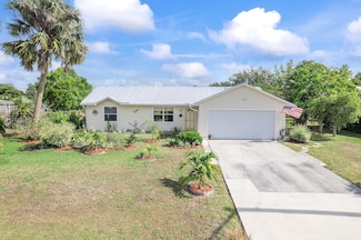 1073 SW Dubuque Ave, Port Saint Lucie, FL 34953