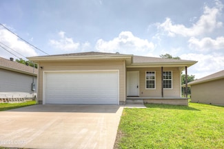 611 S Arch St, Carterville, MO 64835