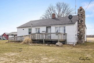 13057 S Butternut Ave, Sand Lake, MI 49343