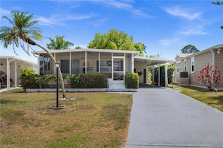 65 San Remo Cir, Naples, FL 34112