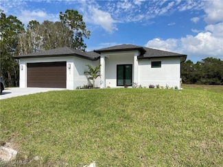615 Addison St E, Lehigh Acres, FL 33974
