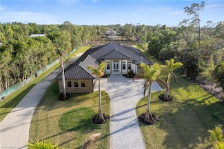 7040 Sable Ridge Ln, Naples, FL 34109