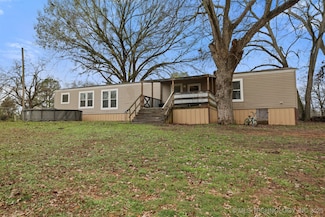 309 W 3rd St, Milburn, OK 73450