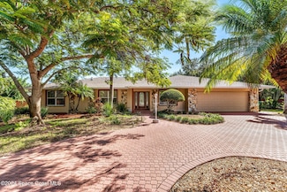 4 Colonial Way, Indian Harbour Beach, FL 32937