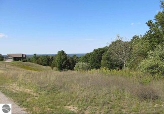 7632 Saddle Horn Dr, Grawn, MI 49637
