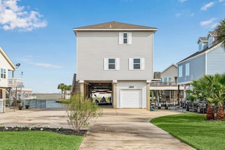 1814 Tiki Dr, Tiki Island, TX 77554