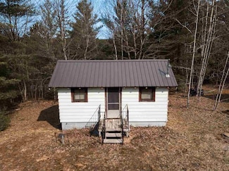 11457 Starvation Lake Rd NE, Mancelona, MI 49659