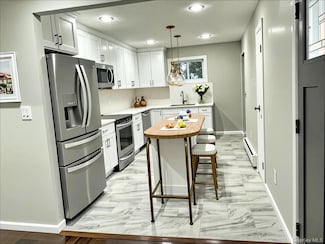 9 Holt St, Amityville, NY 11701