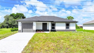 1018 Genoa Ave S, Lehigh Acres, FL 33974