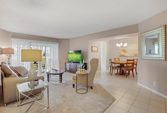 3836 Via Poinciana Unit 205, Lake Worth, FL 33467