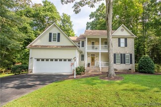 69 Riverboat Ln E, Hartfield, VA 23071
