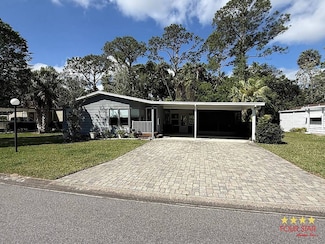 18 Tropical Falls Dr, Ormond Beach, FL 32174